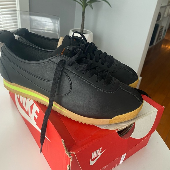 Nike Shoes - NIKE Cortez women’s size 9. Black leather with vibrant neon green. NEW!